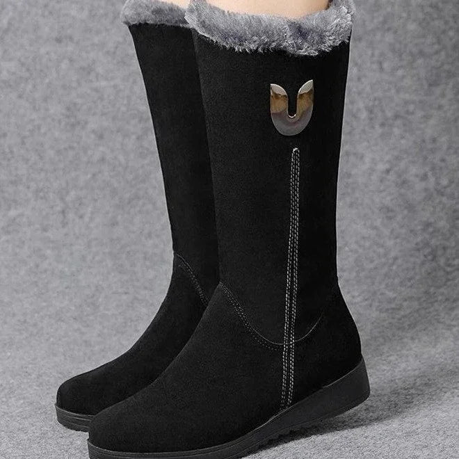 Black suede winter boots with gray fur trim and decorative metal accent, ideal for cold weather