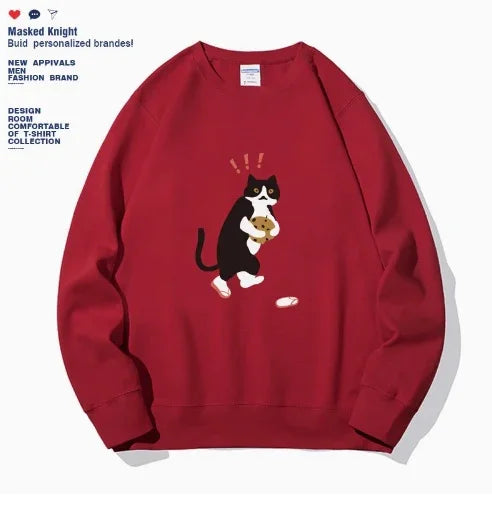 Red sweatshirt with black and white cat holding teddy bear graphic and spilled bottle design