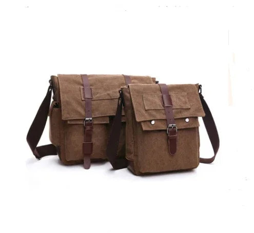 Two brown canvas messenger bags with leather straps and buckles on white background