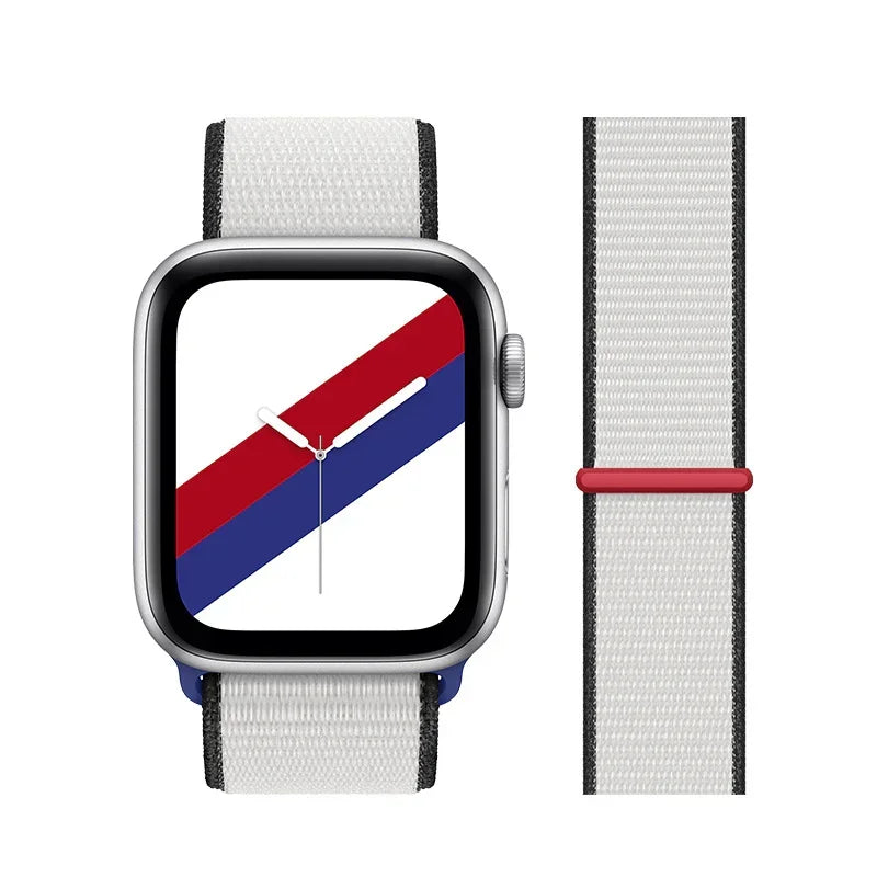Smartwatch with silver case and white nylon sport loop band with black edges and red and blue diagonal stripes on screen