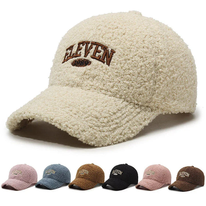 Beige textured sherpa baseball cap with embroidered ELEVEN logo, available in multiple colors