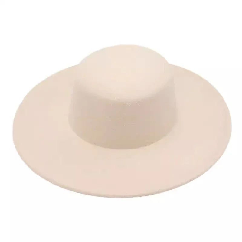 Wide brim beige wool felt hat with a classic round crown against a white background