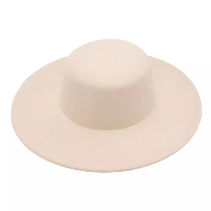 Wide brim beige wool felt hat with a classic round crown against a white background