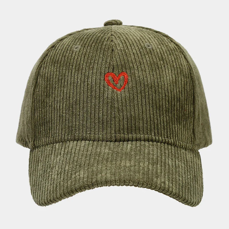 Olive green corduroy baseball cap with small red heart embroidery on front