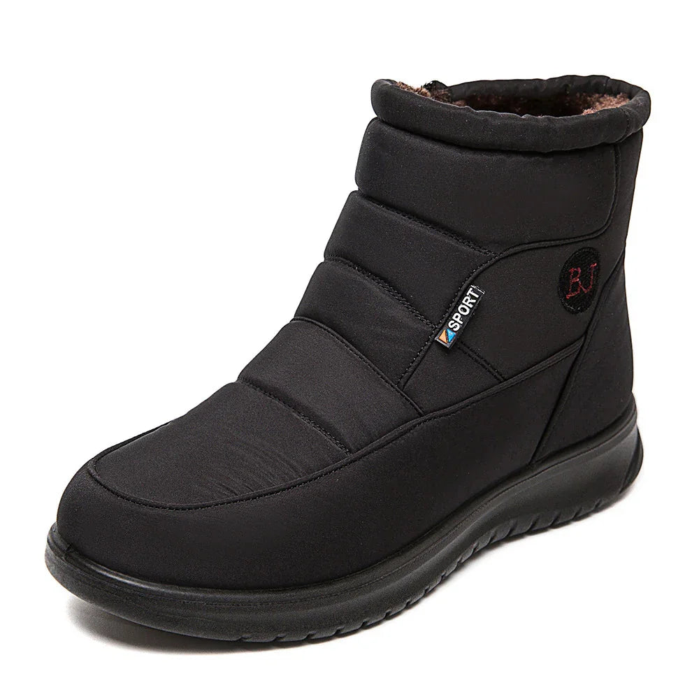 Black insulated winter boot with padded upper, fur lining, and rubber sole for cold weather