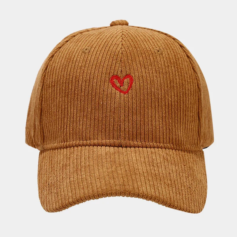 Brown corduroy baseball cap with small red heart embroidery on front