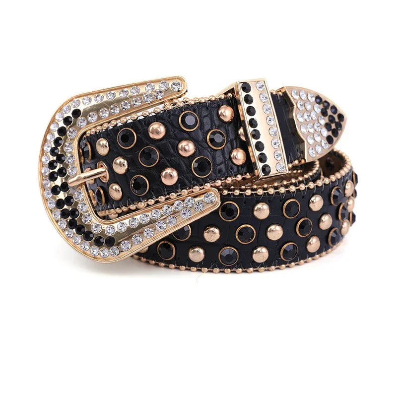 Black leather belt with gold and black studs, and a gold buckle encrusted with clear and black rhinestones