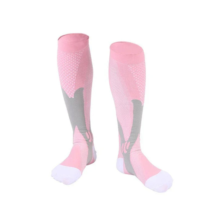 Pair of pink and gray compression knee-high socks with white toes on white background