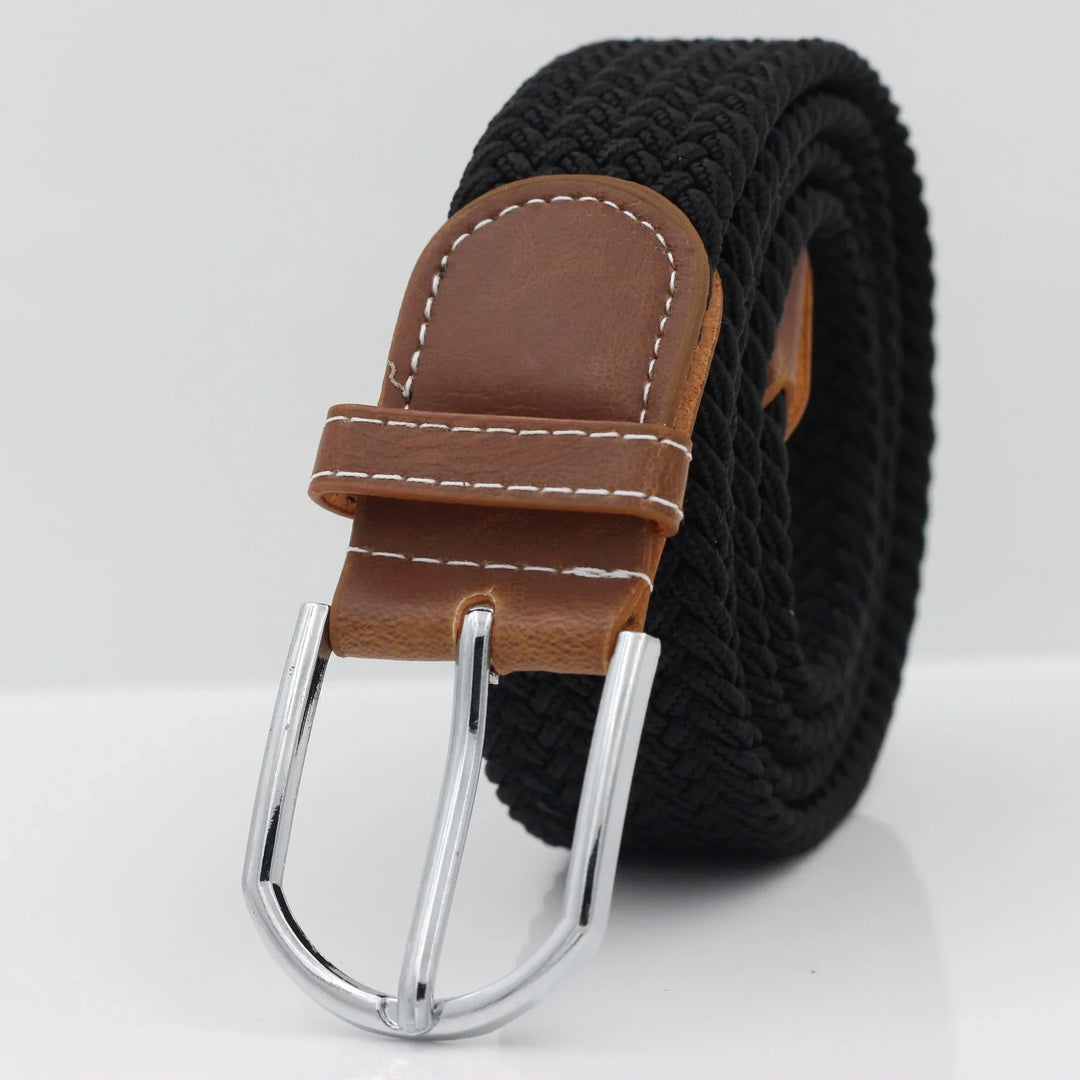 Black woven fabric belt with brown leather buckle and silver metal clasp on white background
