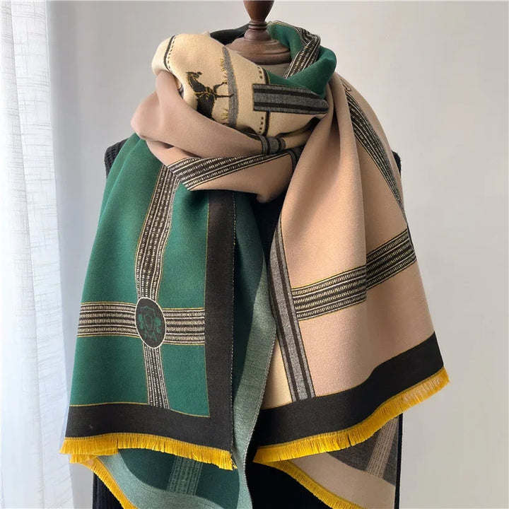 Elegant wool scarf with green, beige, and black geometric patterns, displayed on mannequin
