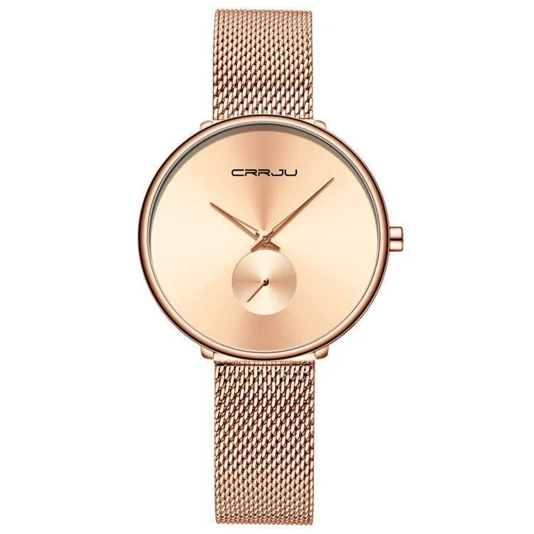 Rose gold minimalist wristwatch with mesh band and small seconds subdial by CRRJU