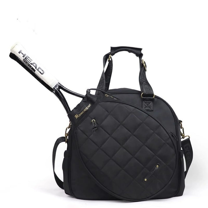 Black quilted tennis bag with a HEAD racquet inside, gold zippers, and dual handles