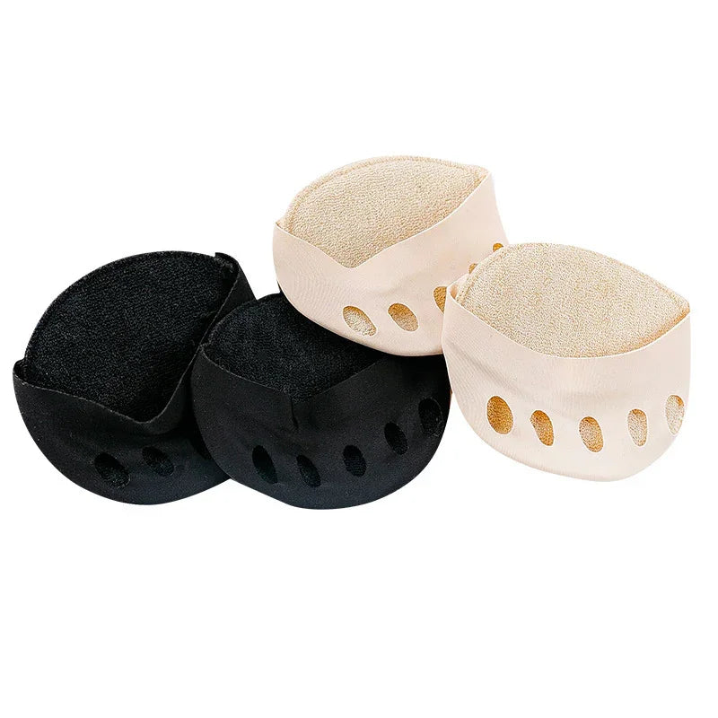 Black and beige ballet toe pads with ventilation holes on a white background