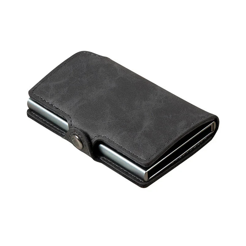 Black leather RFID-blocking minimalist wallet with metal card holder and snap closure