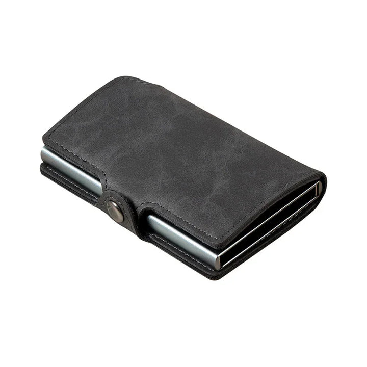 Black leather RFID-blocking minimalist wallet with metal card holder and snap closure