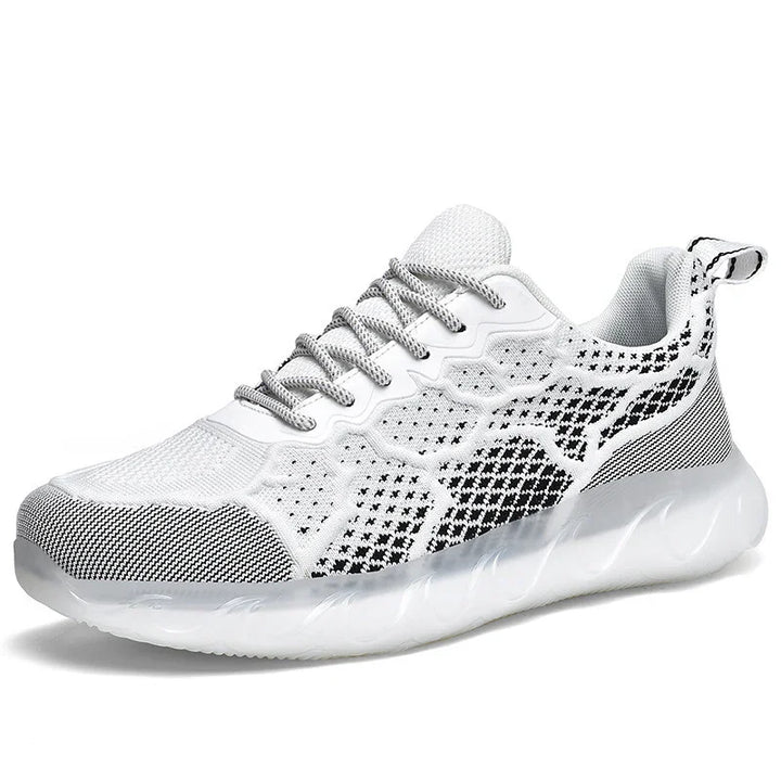 White and black lightweight breathable sneaker with textured sole and lace-up design