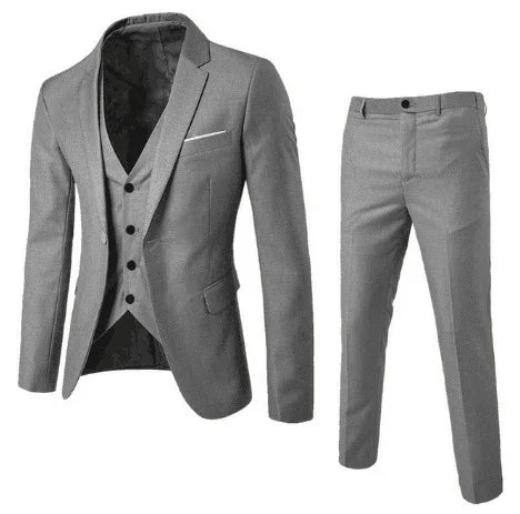 Stylish light gray men's three-piece suit with blazer, vest, and matching pants