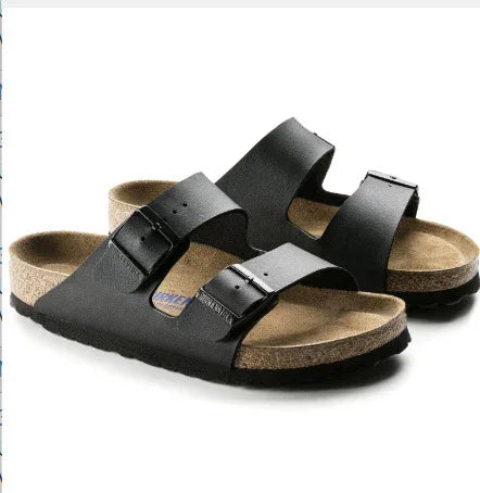 Black leather double strap Birkenstock sandals with cork footbed and buckle closures