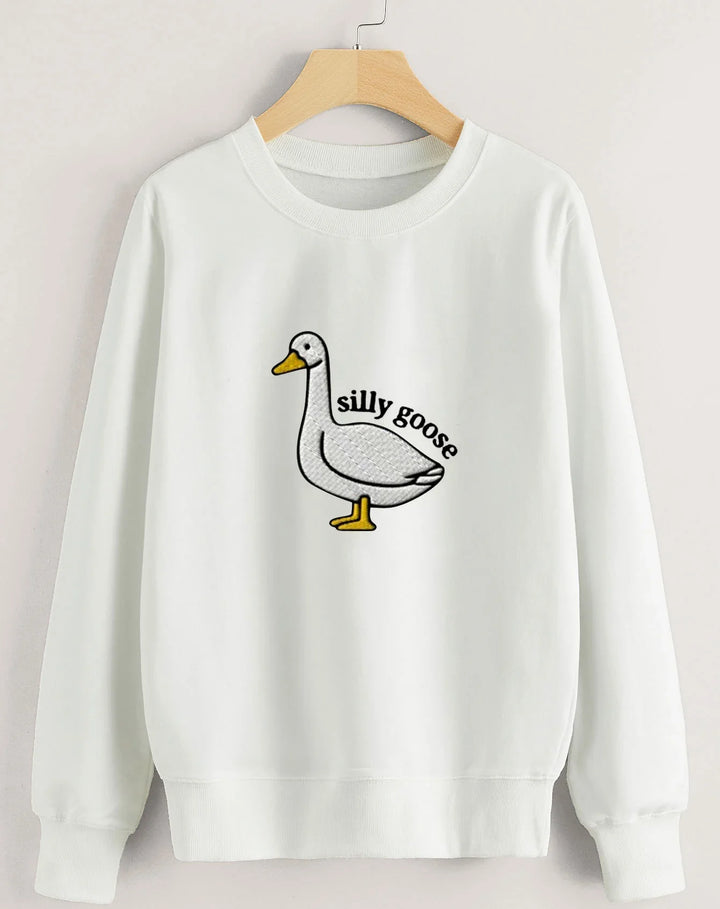White sweatshirt with embroidered silly goose graphic and text on front