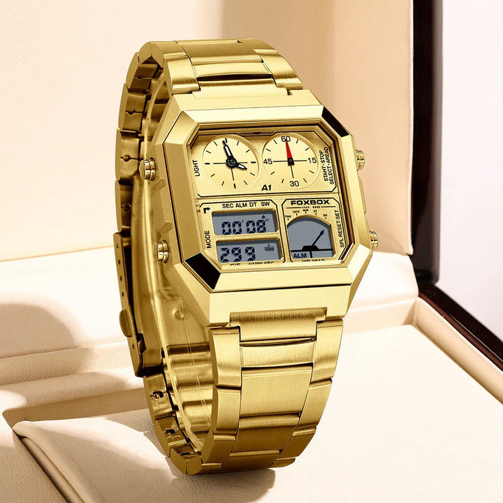 Gold-tone Foxbox digital analog wristwatch with multifunction dials on a beige display cushion