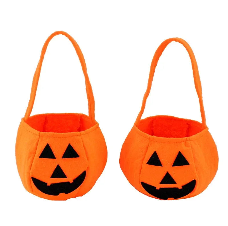 Two orange Halloween pumpkin trick-or-treat bags with black jack-o'-lantern faces and handles