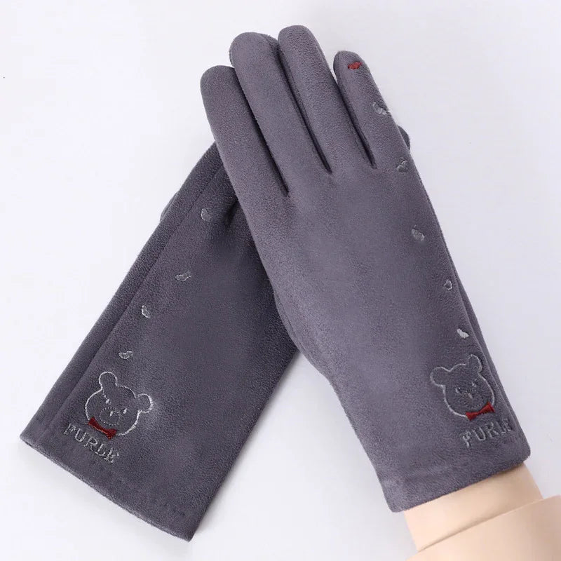 Gray fleece winter gloves with bear embroidery and red bow tie detail on a white background