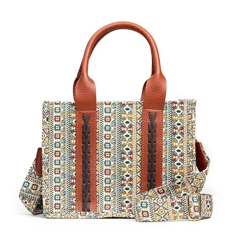 Bohemian style tote bag with multicolor geometric pattern and brown leather handles and accents