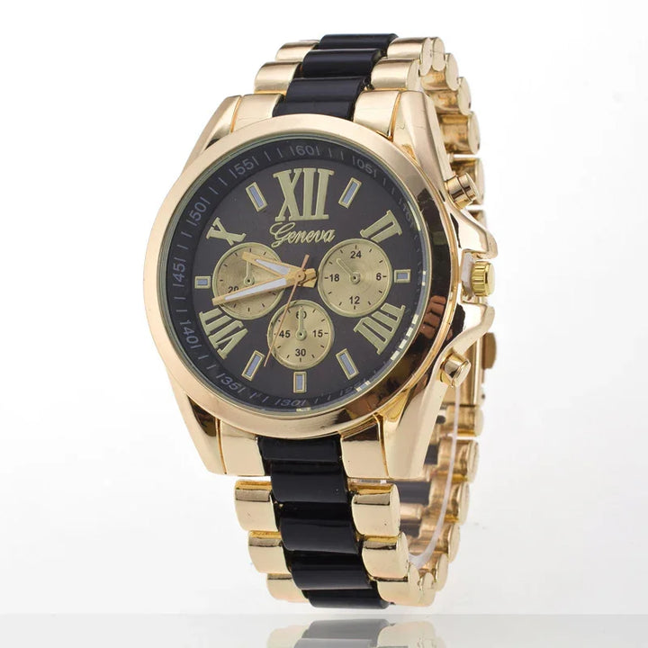 Gold and black Geneva wristwatch with Roman numerals and three subdials on a metal link band