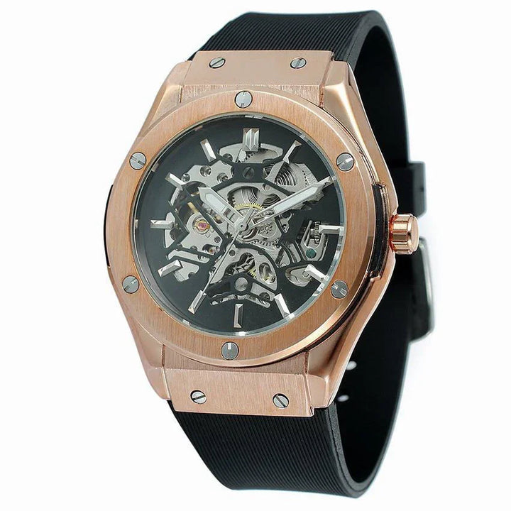 Rose gold skeleton dial wristwatch with black rubber strap and silver screws on bezel