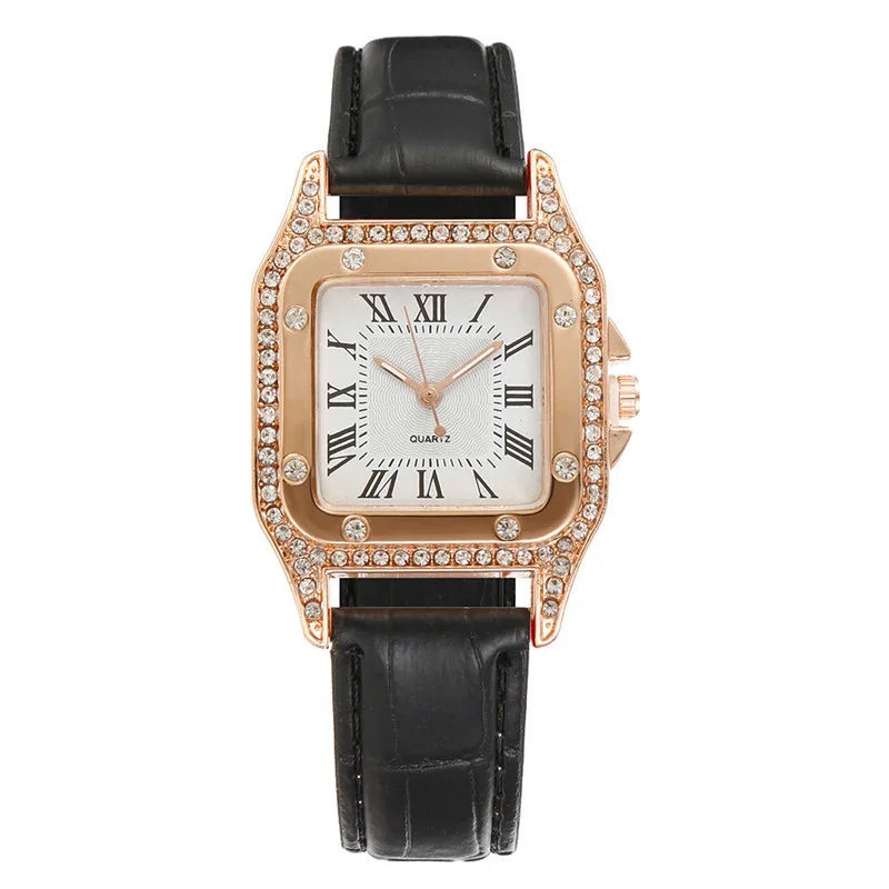Square gold quartz watch with black leather strap and crystal-studded bezel with Roman numerals