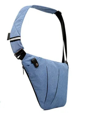 Light blue ergonomic sling bag with black adjustable strap and zipper pocket on white background