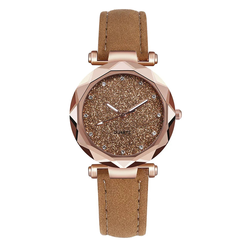 Rose gold watch with glittery brown dial and tan suede leather strap