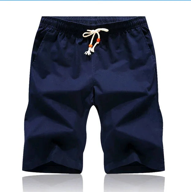 Navy blue casual men's shorts with elastic waistband and white drawstring with wooden beads