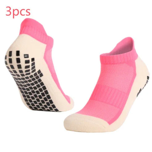 Pair of pink non-slip grip socks with black rubber sole patterns, 3-piece set