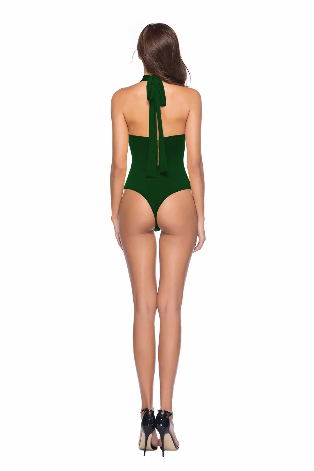 Woman wearing dark green halter neck thong bodysuit and black high heels, viewed from back