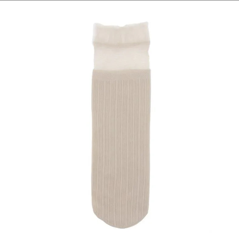 Single beige and white ribbed cotton sock with cuff, isolated on white background