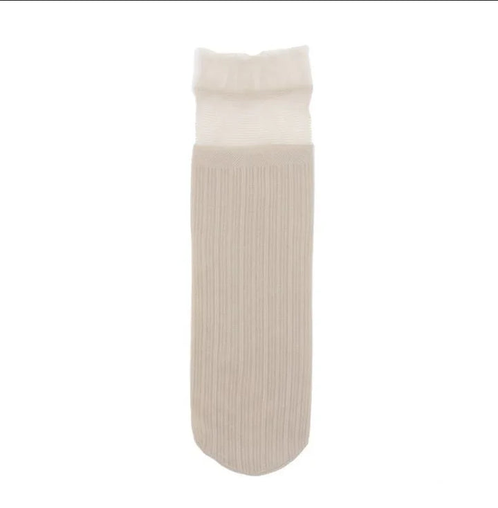 Single beige and white ribbed cotton sock with cuff, isolated on white background