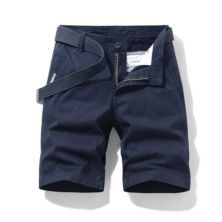 Men's navy blue casual shorts with belt, zipper, and button closure on white background