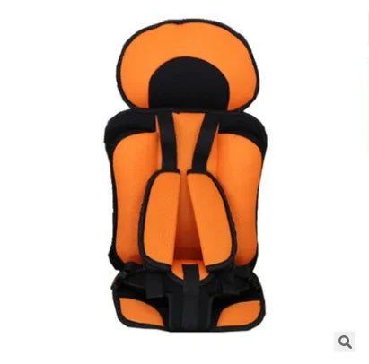 Orange and black padded child car seat with adjustable harness