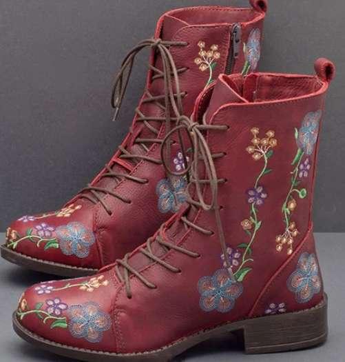 Red leather lace-up ankle boots with blue and purple floral embroidery and side zipper