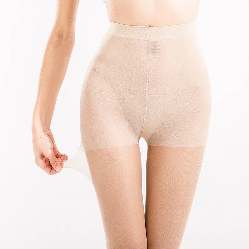 Close-up of woman wearing beige high-waisted sheer nylon pantyhose, demonstrating stretch