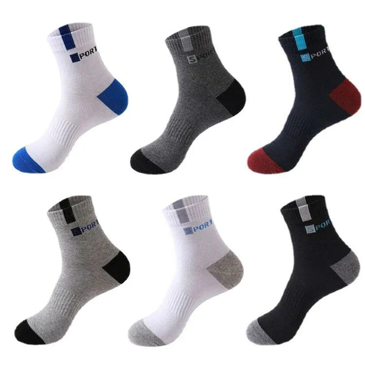 Set of six sports ankle socks in white, gray, navy, and black with colored heels and toes