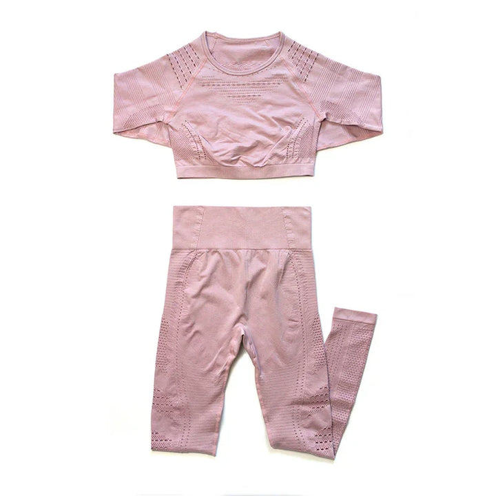 pink seamless women's workout set with long sleeve crop top and high waist leggings