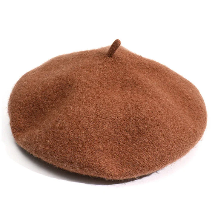 classic brown wool beret hat with top stem on white background