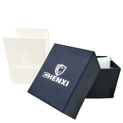 Open black and white CHENXI branded watch boxes with logo shield emblem on lids