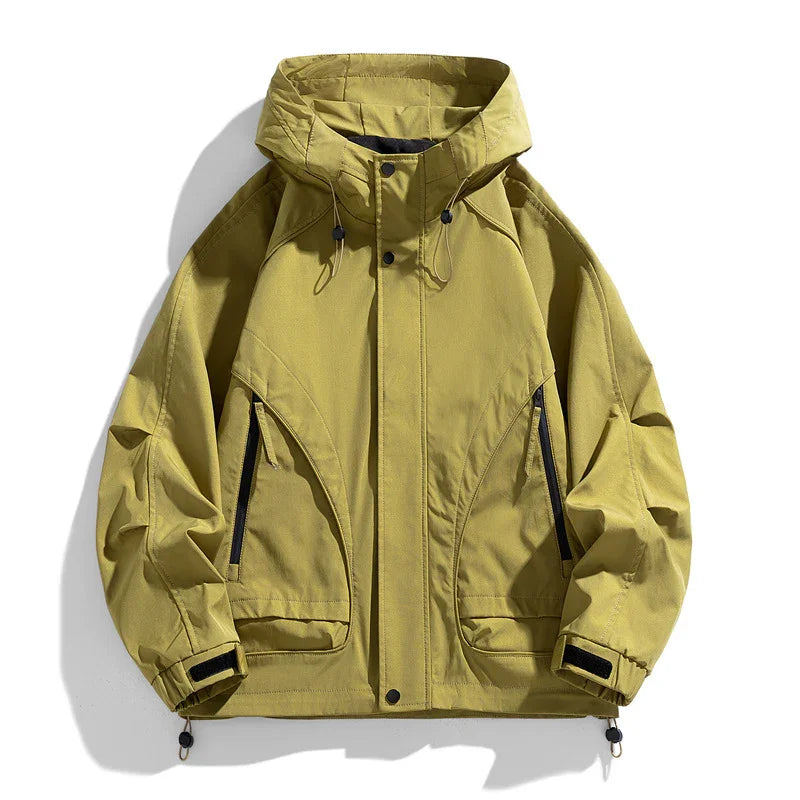 Yellow hooded outdoor jacket with zipper pockets and adjustable cuffs on white background