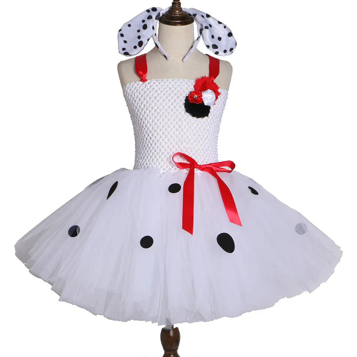 White tutu dress with black polka dots, red satin straps and bow, paired with dalmatian ear headband
