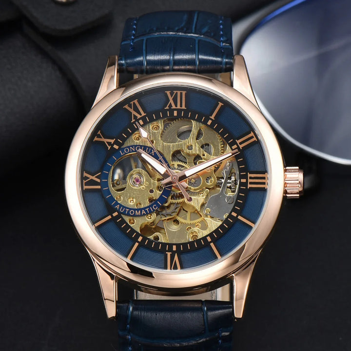 Luxury automatic skeleton watch with blue strap, rose gold case, and Roman numerals