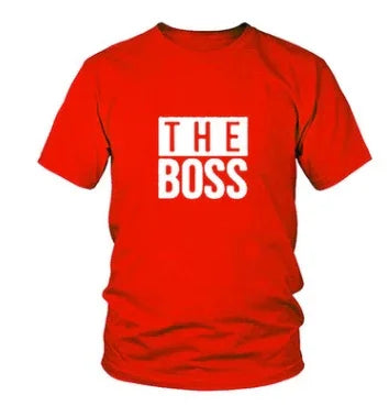 Red short-sleeve t-shirt with bold white text graphic reading 'THE BOSS' on the front