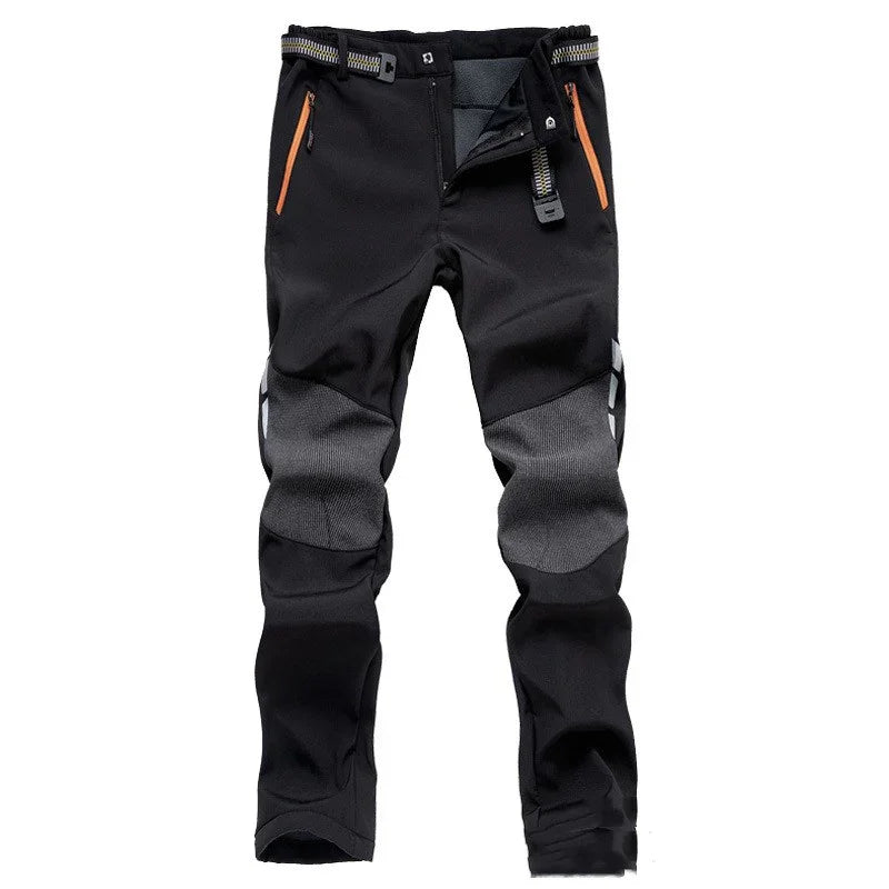 Black outdoor hiking pants with reinforced knee patches and orange zippered pockets